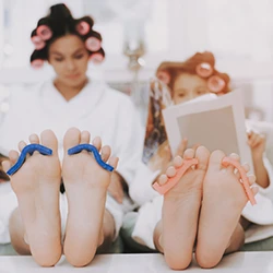 Parent and child pedicure with toe separators