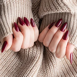Long burgundy almond nail enhancements